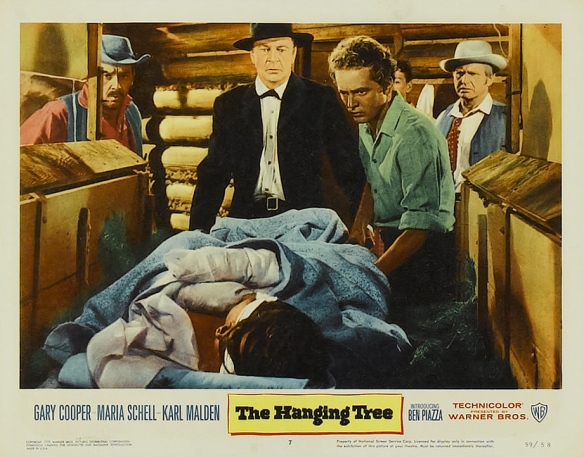 Gary Cooper (center), Ben Piazza (right of Cooper) in The Hanging Tree (1959)