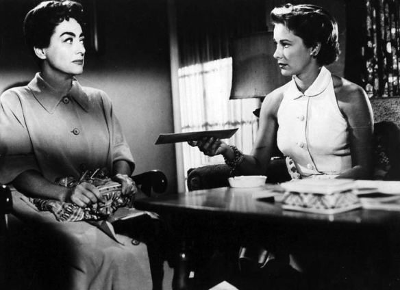 Vera Miles (right) confronts Joan Crawford with the truth about her young, unstable husband in Autumn Leaves (1956).